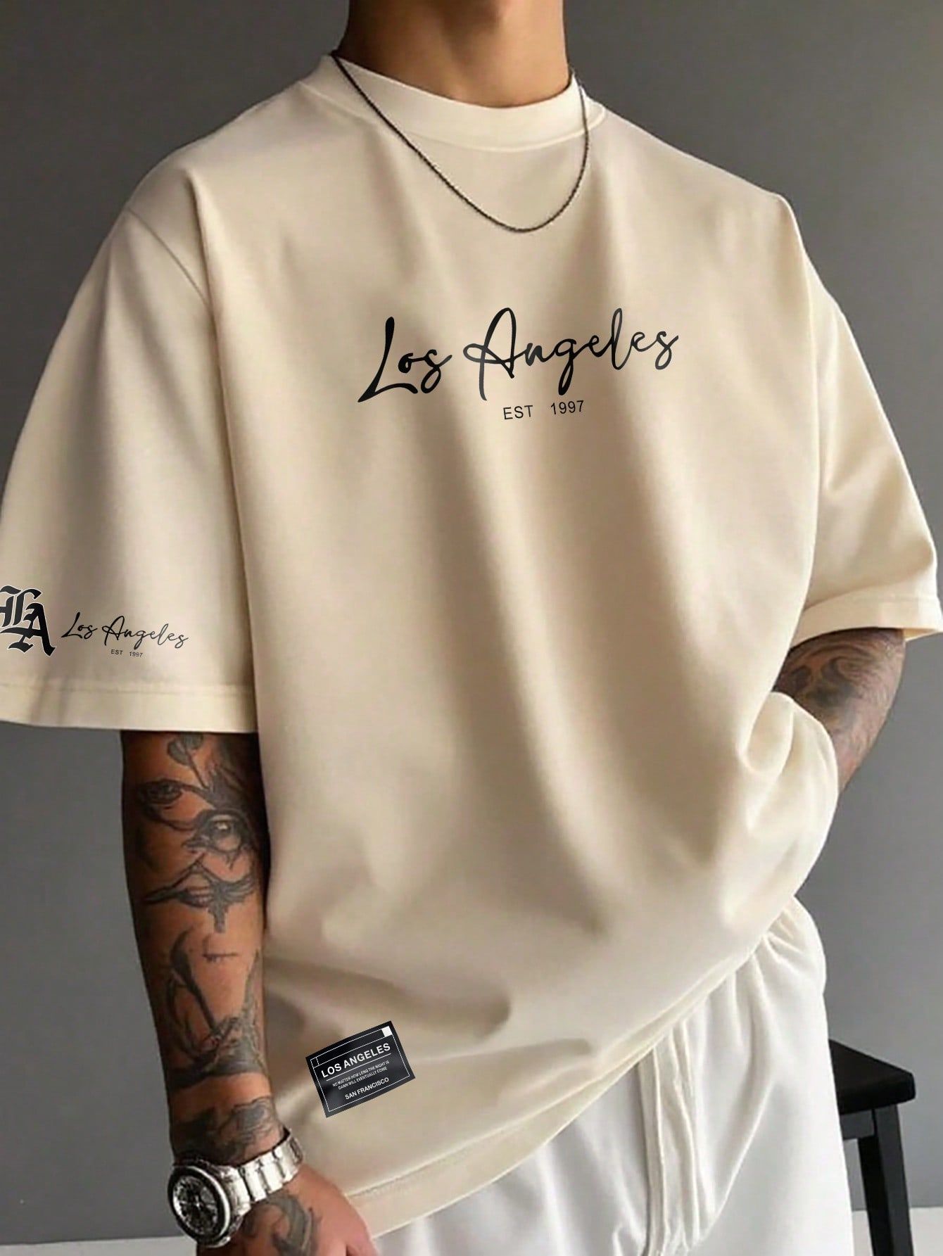 A guy wearing casual urban clothing while inside.